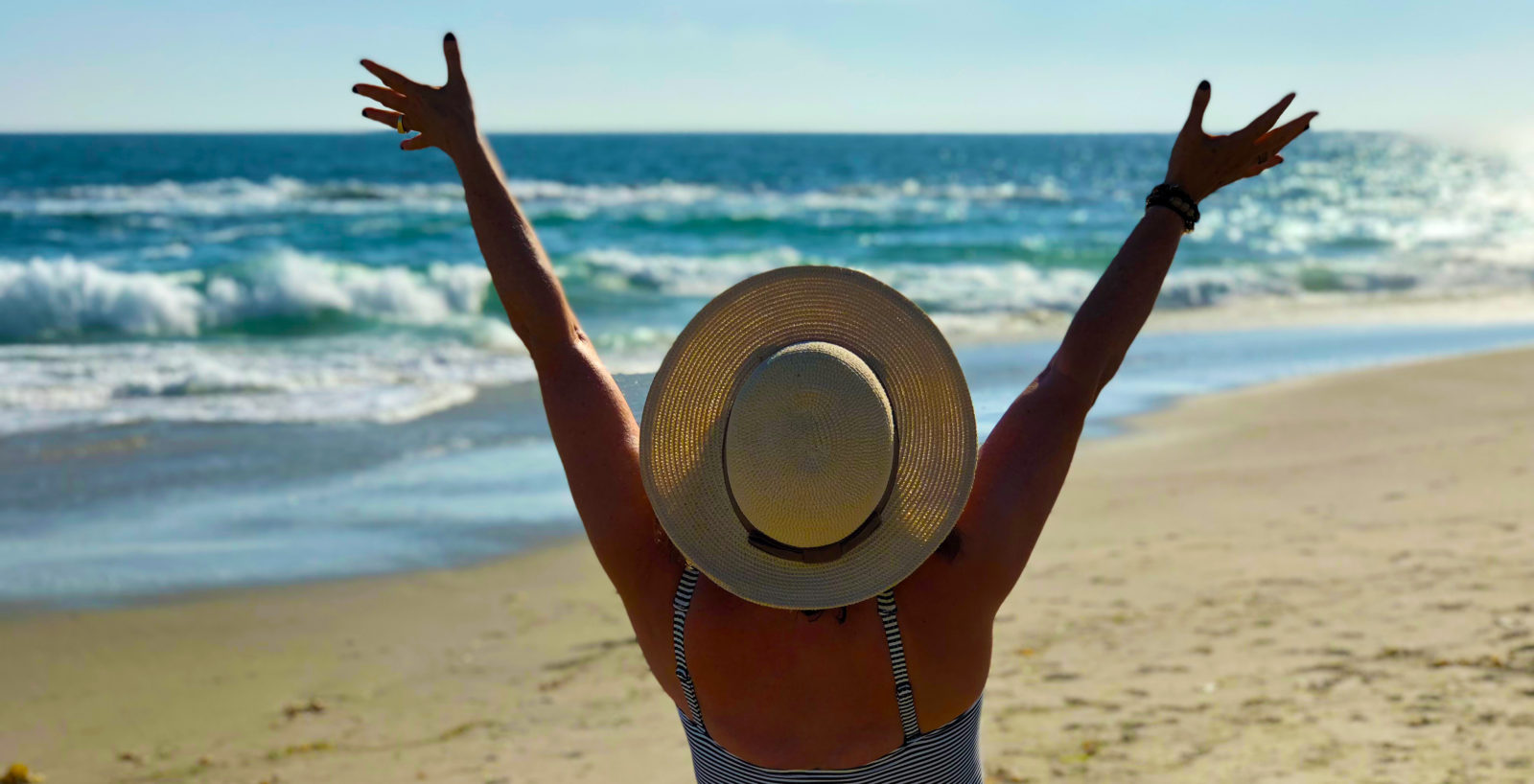 Me at my "happy place" the beach!